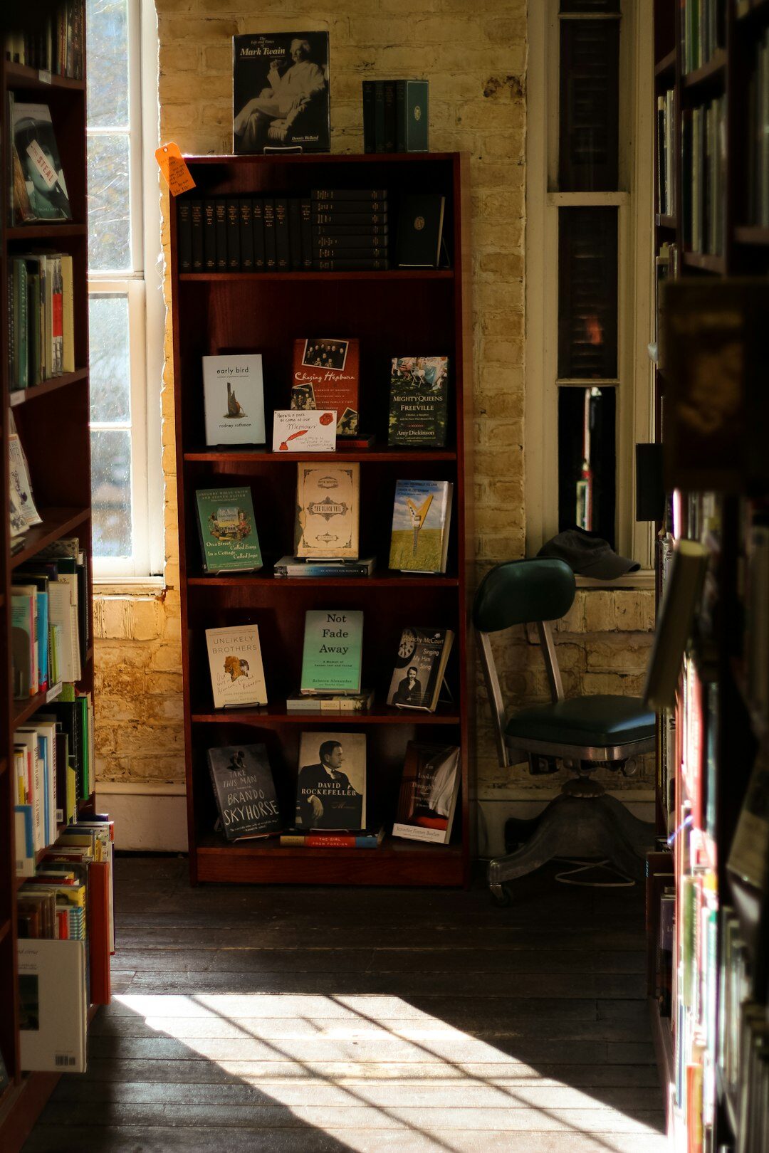 Old bookshop interior with narrow aisles of books