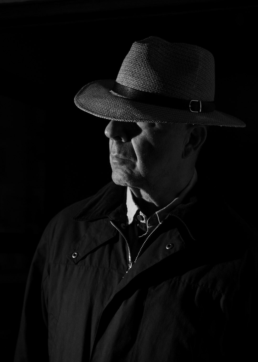 detective in fedora hat