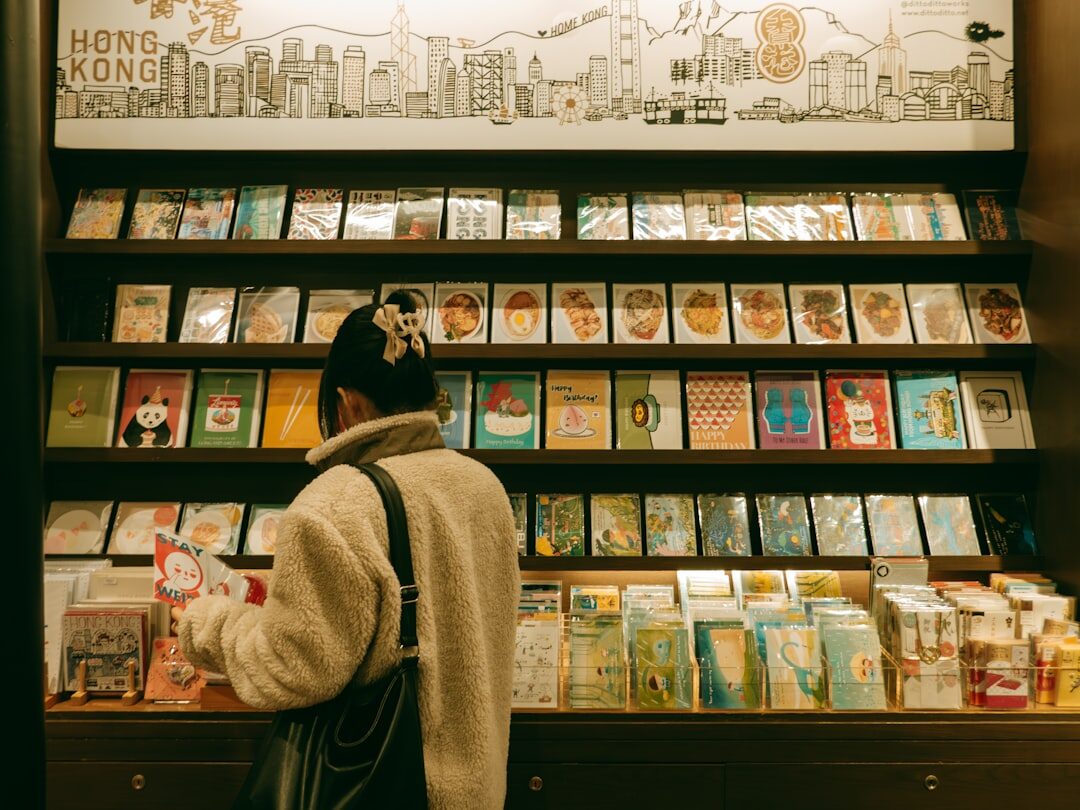 person browsing bookstore shelves